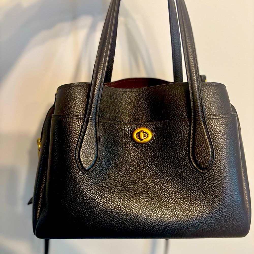 Elegant Black Leather Coach Handbag